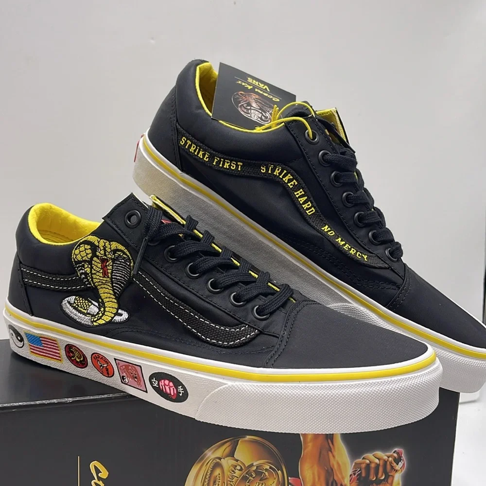 Vans Men’s Old Skool
Cobra Kai Black/Yellow/White 
VN0A3WKT05N
Sneakers - Picture 5 of 16